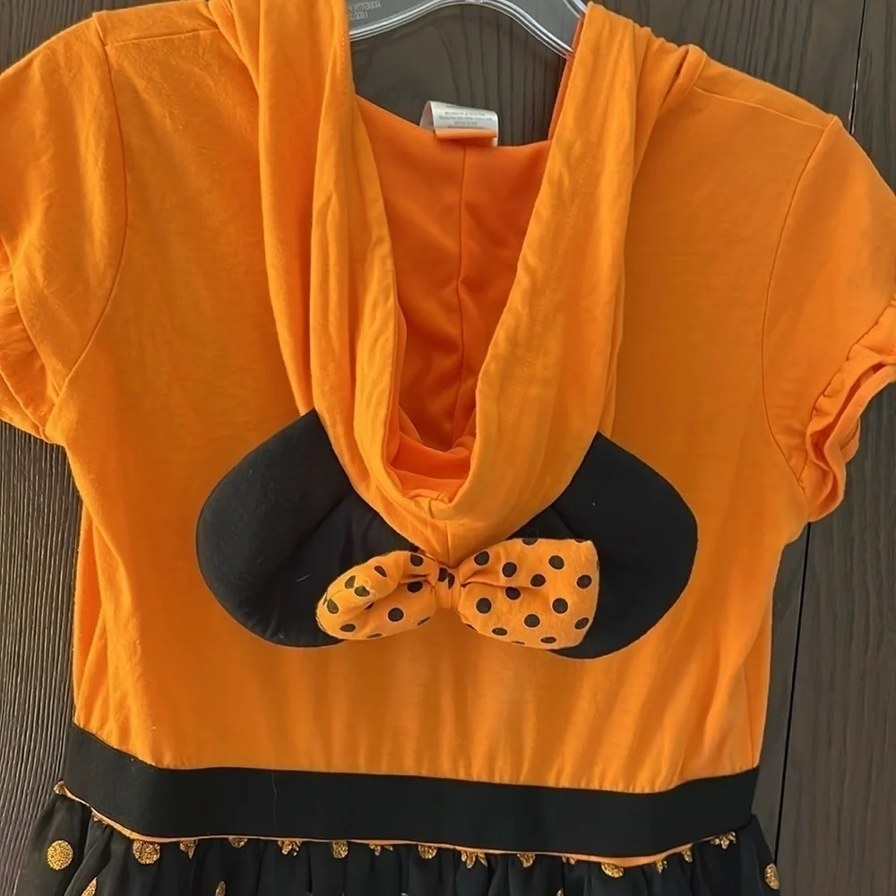 Disney child’s Minnie Mouse Halloween dress with hood with mouse ears. Size XL
